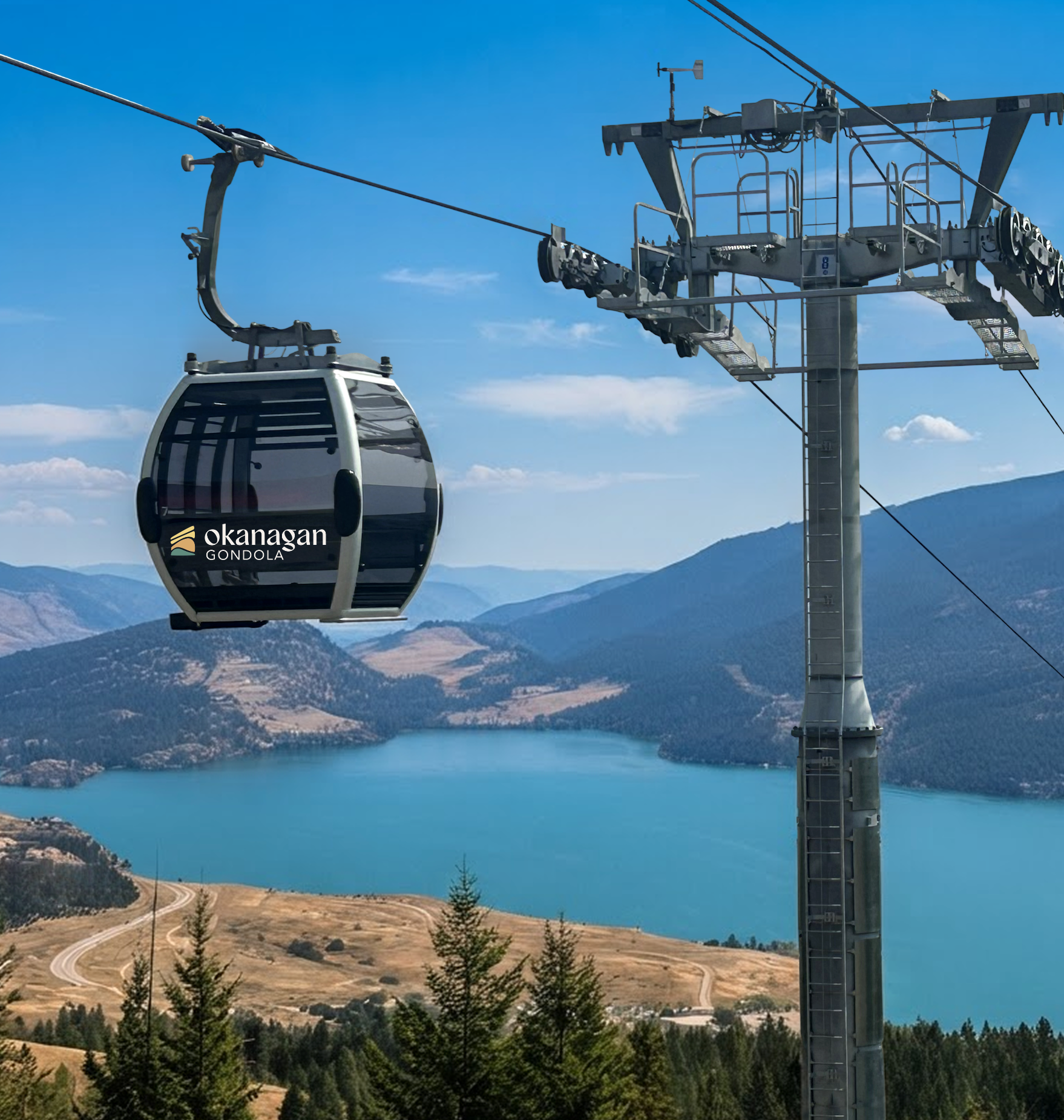 Modern CWA gondola cabin passing a steel lift tower with panoramic views of Kalamalka Lake and surrounding mountains at the Okanagan Gondola.