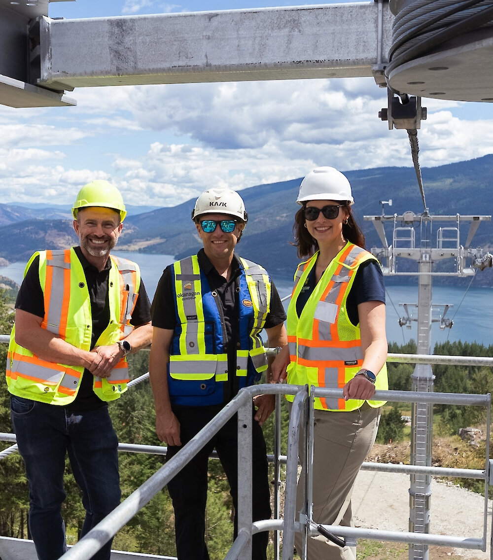 The Okanagan Gondola team stands together on the gondola terminal